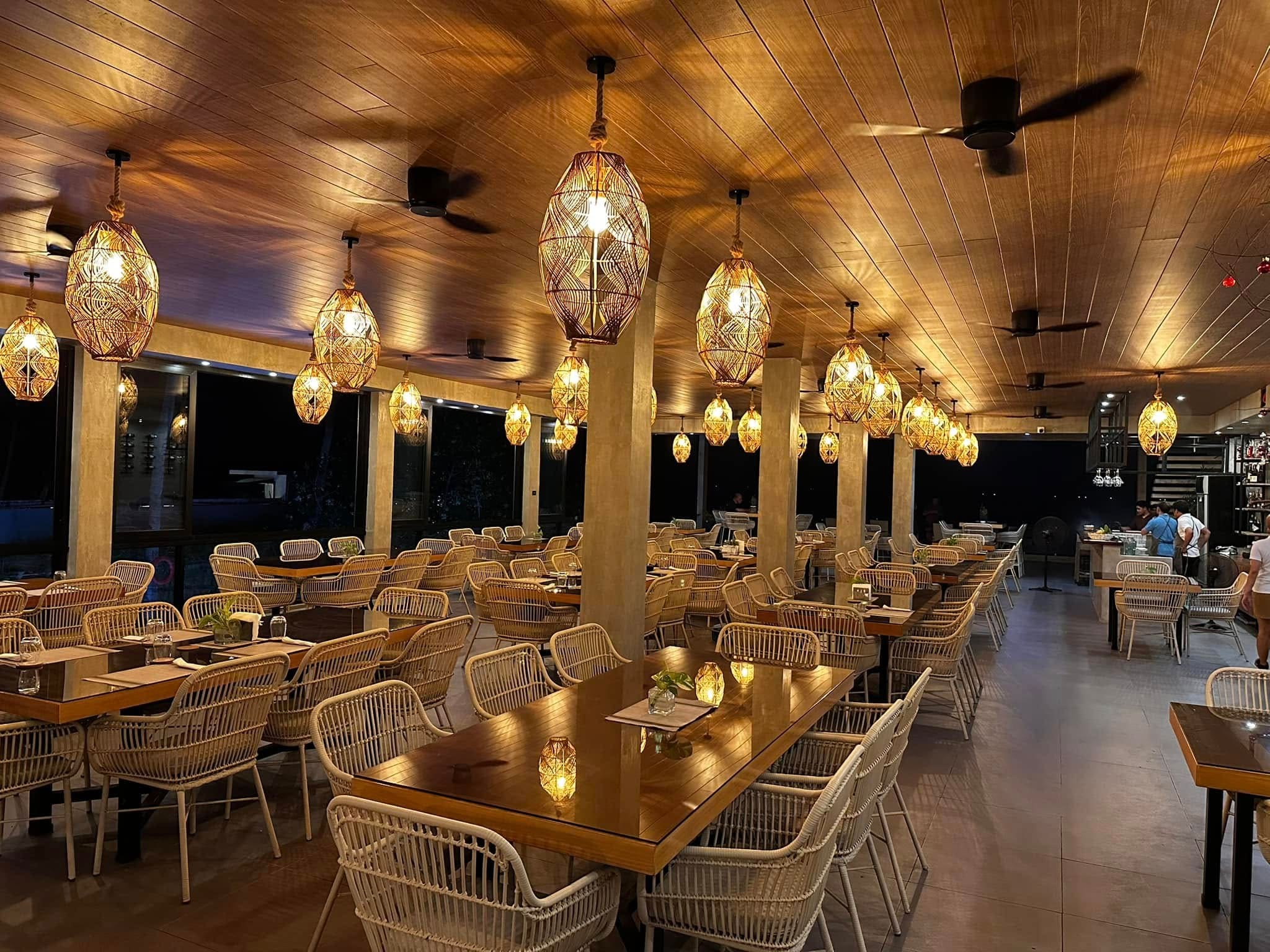 Casa Escondida restaurant at night with warm lanterns