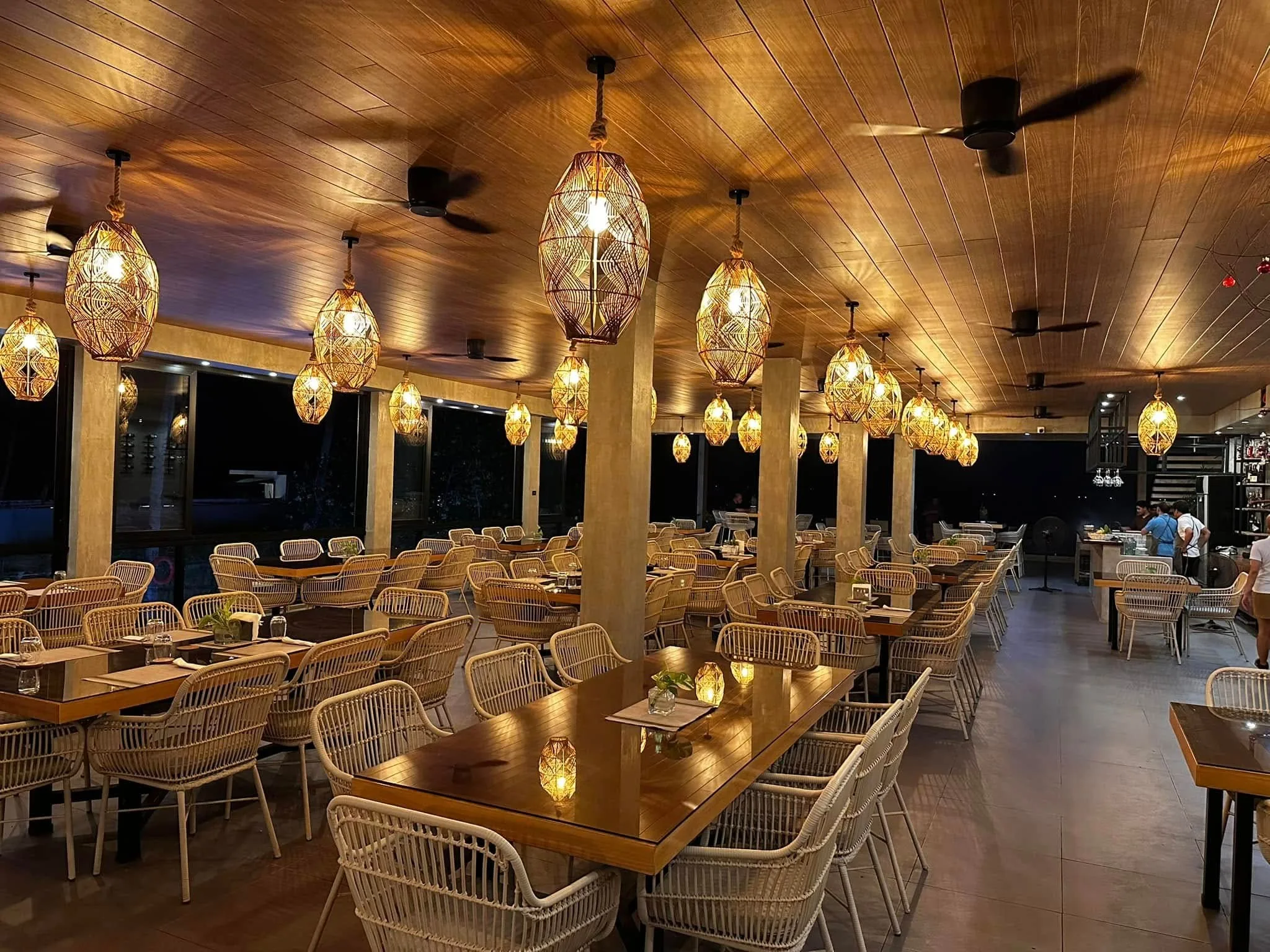 Casa Escondida restaurant at night with warm lanterns