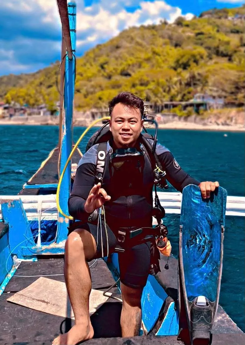 Jayson C. Dipasupil on the dive boat in Anilao